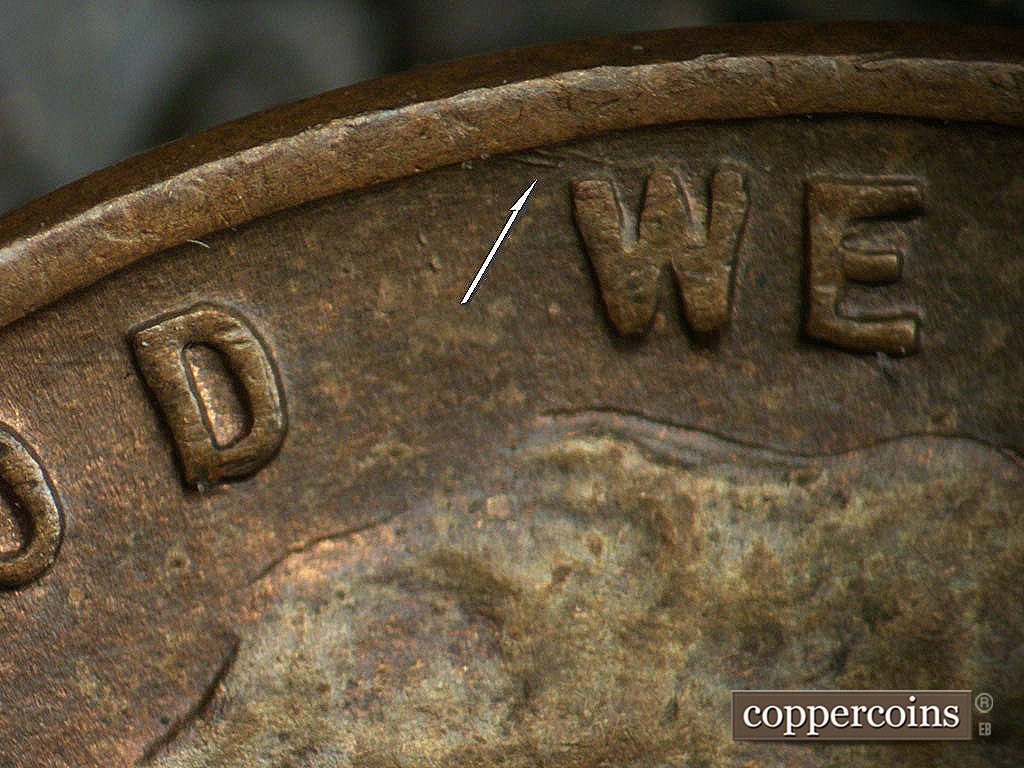 Die-stage B marker on 1937D•1DO•005 showing SE die scratches from rim into W of WE.
