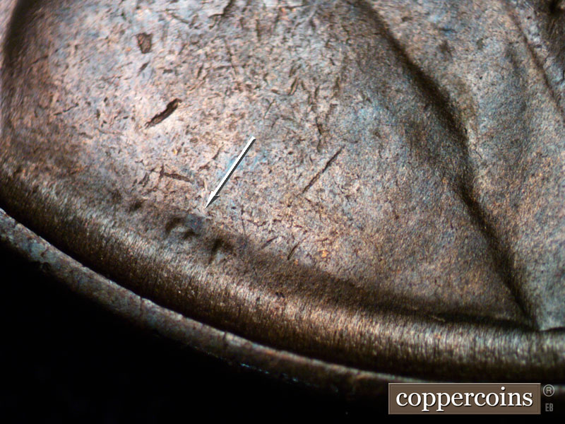 Die-stage B marker on 1937D•1DR•002 (1937 Doubled Die Reverse).