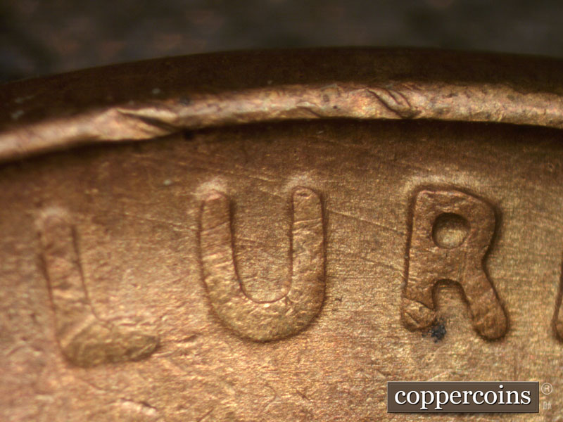 Die-stage B marker on 1937P•1DO•003 (1937 Doubled Die Obverse).
