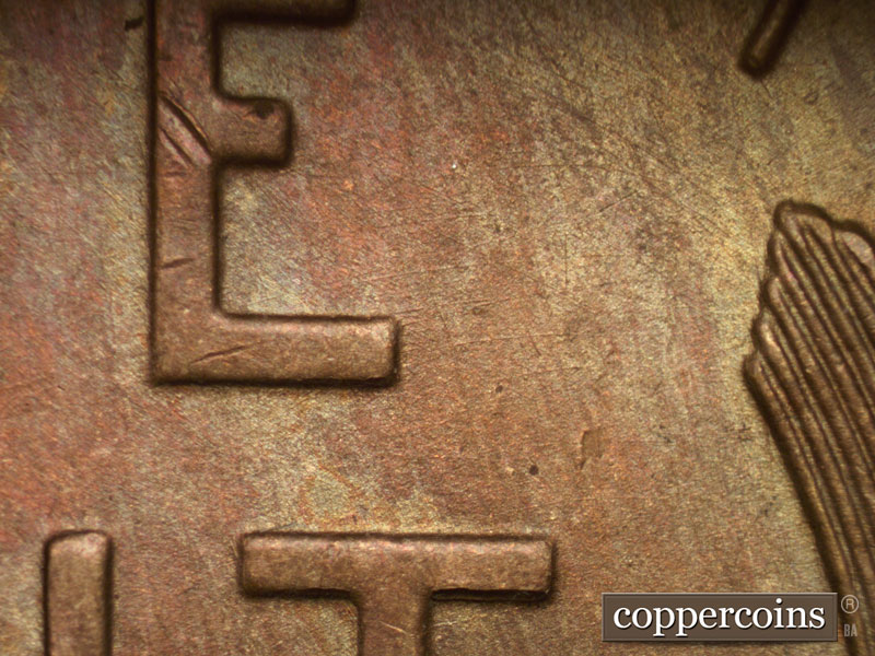 Die-stage B marker on 1937P•1DO•003 (1937 Doubled Die Obverse).