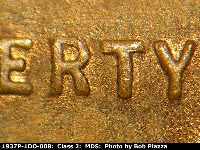 Die-stage B marker on 1937P•1DO•008 (1937 Doubled Die Obverse).