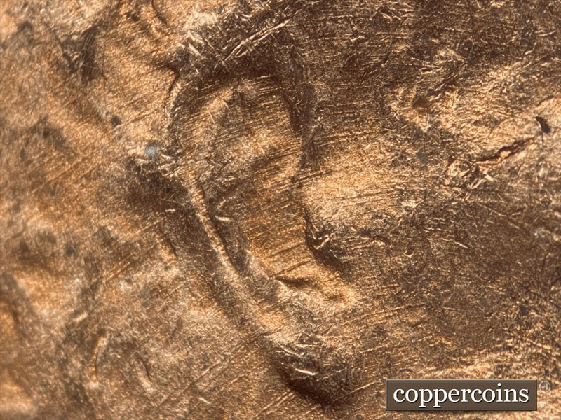 Die-stage B marker on 1937P•1DO•011 (1937 Doubled Die Obverse).