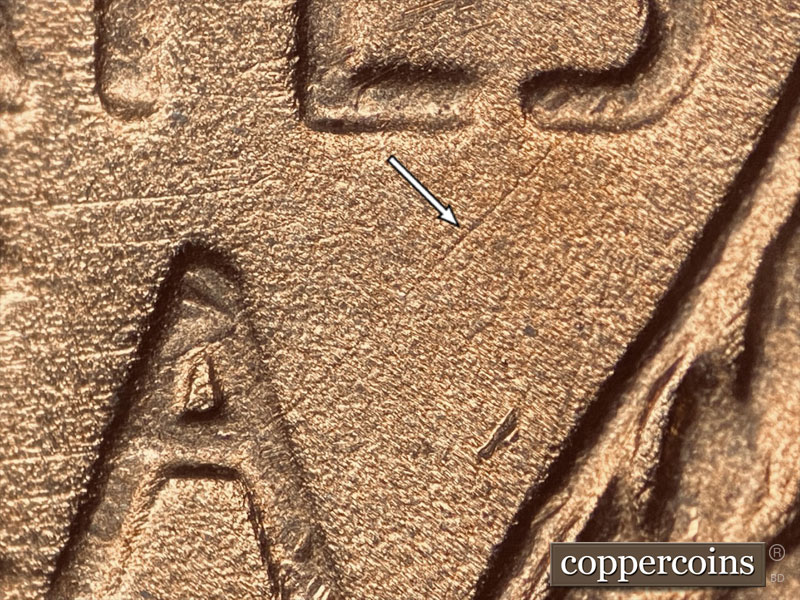 Die-stage B marker on 1937P•1DO•011 (1937 Doubled Die Obverse).