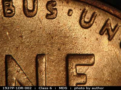 Die-stage B marker on 1937P•1DR•002 (1937 Doubled Die Reverse).