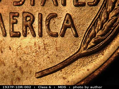 Die-stage B marker on 1937P•1DR•002 (1937 Doubled Die Reverse).