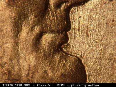 Die-stage B marker on 1937P•1DR•002 (1937 Doubled Die Reverse).