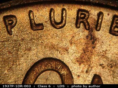 Die-stage C marker on 1937P•1DR•003 (1937 Doubled Die Reverse).