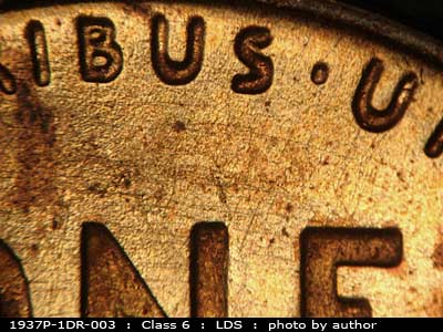 Die-stage C marker on 1937P•1DR•003 (1937 Doubled Die Reverse).