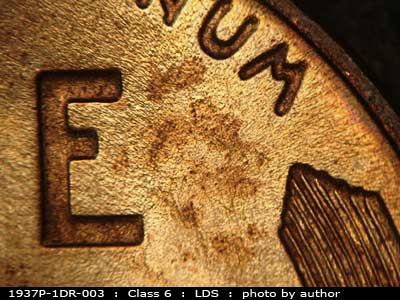 Die-stage C marker on 1937P•1DR•003 (1937 Doubled Die Reverse).