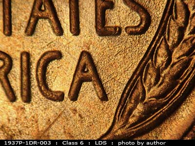Die-stage C marker on 1937P•1DR•003 (1937 Doubled Die Reverse).