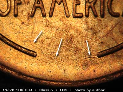 Die-stage C marker on 1937P•1DR•003 (1937 Doubled Die Reverse).