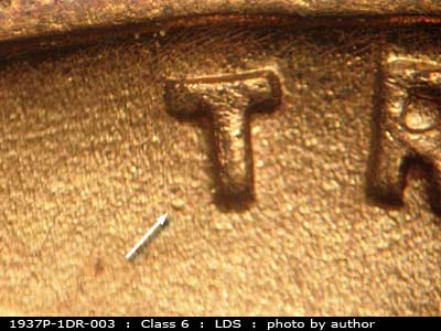 Die-stage C marker on 1937P•1DR•003 (1937 Doubled Die Reverse).