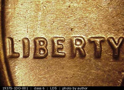 Die-stage C marker on 1937S•1DO•001 (1937 Doubled Die Obverse).