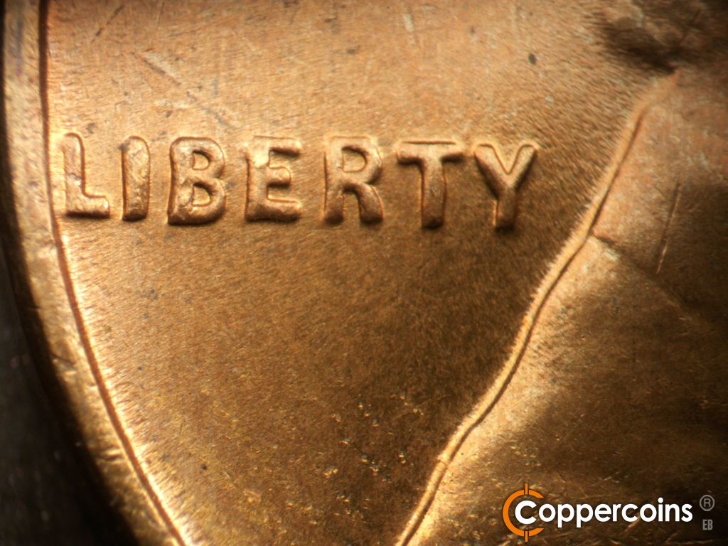 Die-stage B marker on 1937S•1DO•002 showing Extra thickness on LIBERTY.