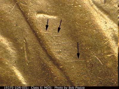 Die-stage B marker on 1937S•1DR•001 (1937 Doubled Die Reverse).