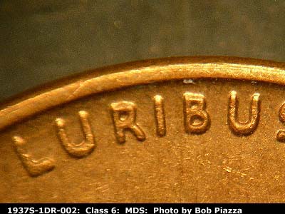 Die-stage B marker on 1937S•1DR•002 (1937 Doubled Die Reverse).