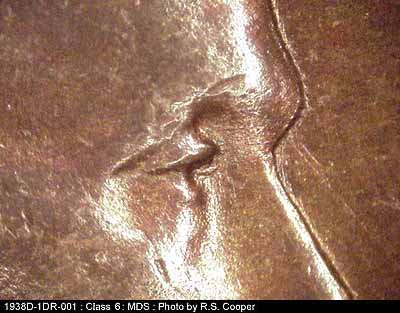 Die-stage B marker on 1938D•1DR•001 (1938 Doubled Die Reverse).