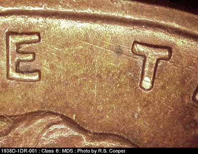 Die-stage B marker on 1938D•1DR•001 (1938 Doubled Die Reverse).