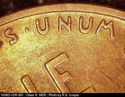 Die-stage B marker on 1938D•1DR•001 (1938 Doubled Die Reverse).