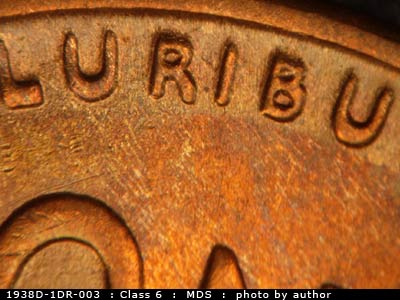Die-stage B marker on 1938D•1DR•003 (1938 Doubled Die Reverse).