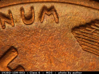 Die-stage B marker on 1938D•1DR•003 (1938 Doubled Die Reverse).