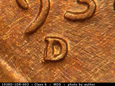 Die-stage B marker on 1938D•1DR•003 (1938 Doubled Die Reverse).