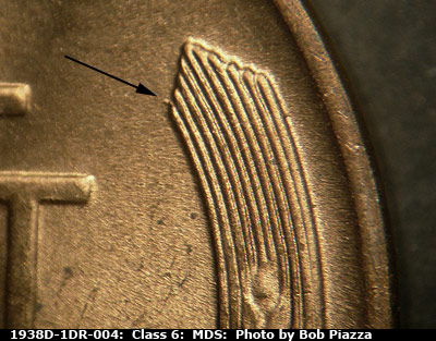 Die-stage B marker on 1938D•1DR•004 (1938 Doubled Die Reverse).