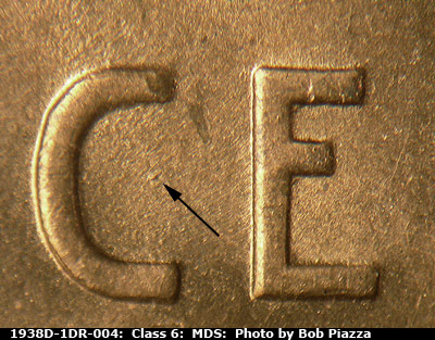 Die-stage B marker on 1938D•1DR•004 (1938 Doubled Die Reverse).