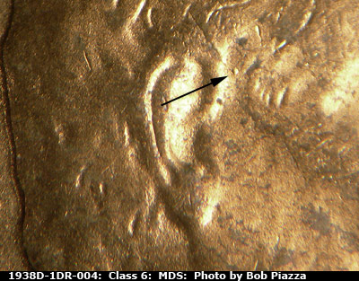 Die-stage B marker on 1938D•1DR•004 (1938 Doubled Die Reverse).