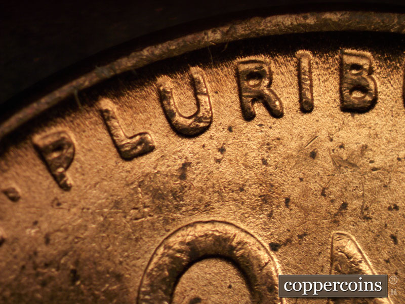 Die-stage C marker on 1938P•1DR•001 (1938 Doubled Die Reverse).