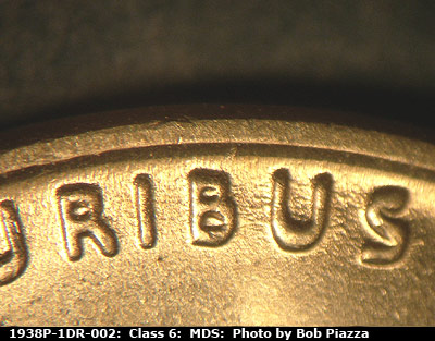Die-stage B marker on 1938P•1DR•002 (1938 Doubled Die Reverse).