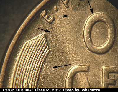 Die-stage B marker on 1938P•1DR•002 (1938 Doubled Die Reverse).