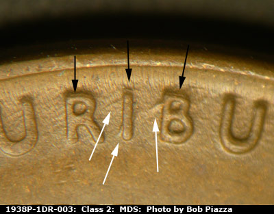 Die-stage B marker on 1938P•1DR•003 (1938 Doubled Die Reverse).