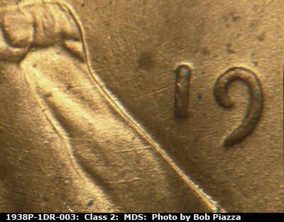 Die-stage B marker on 1938P•1DR•003 (1938 Doubled Die Reverse).