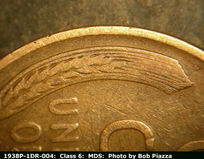 Die-stage B marker on 1938P•1DR•004 (1938 Doubled Die Reverse).