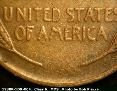 Die-stage B marker on 1938P•1DR•004 (1938 Doubled Die Reverse).