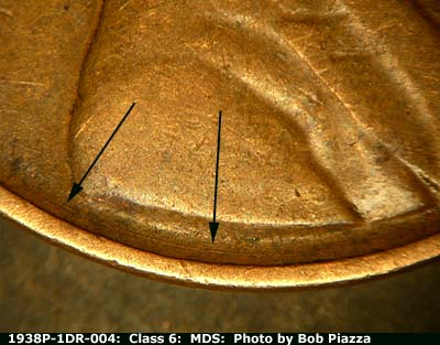 Die-stage B marker on 1938P•1DR•004 (1938 Doubled Die Reverse).