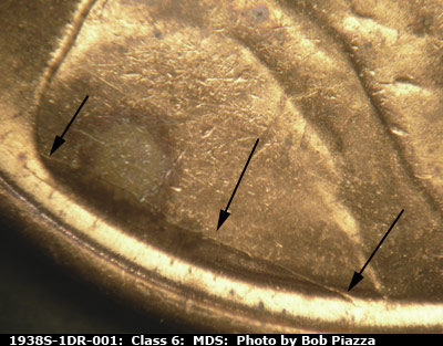Die-stage B marker on 1938S•1DR•001 (1938 Doubled Die Reverse).