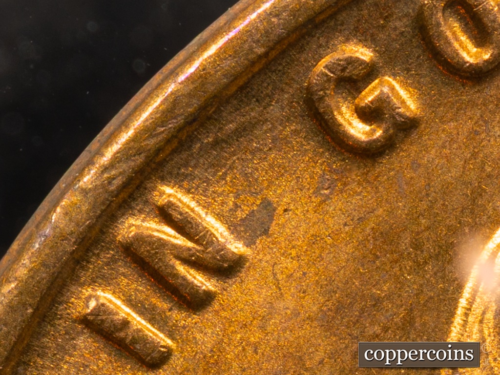 Die-stage G marker on 1938S•1MM•001 showing Die Gouge above IN is faint but still visible.