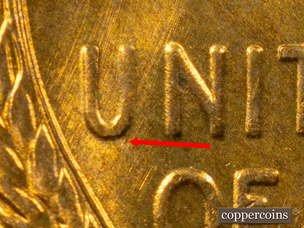 Die-stage G marker on 1938S•1MM•001 showing Die Gouge on bottom right of U still visible but faint.