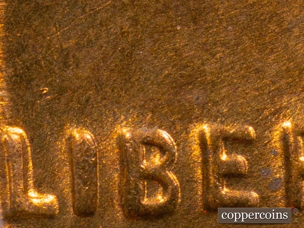 Die-stage G marker on 1938S•1MM•001 showing Die chip still above LI in LIBERTY.
