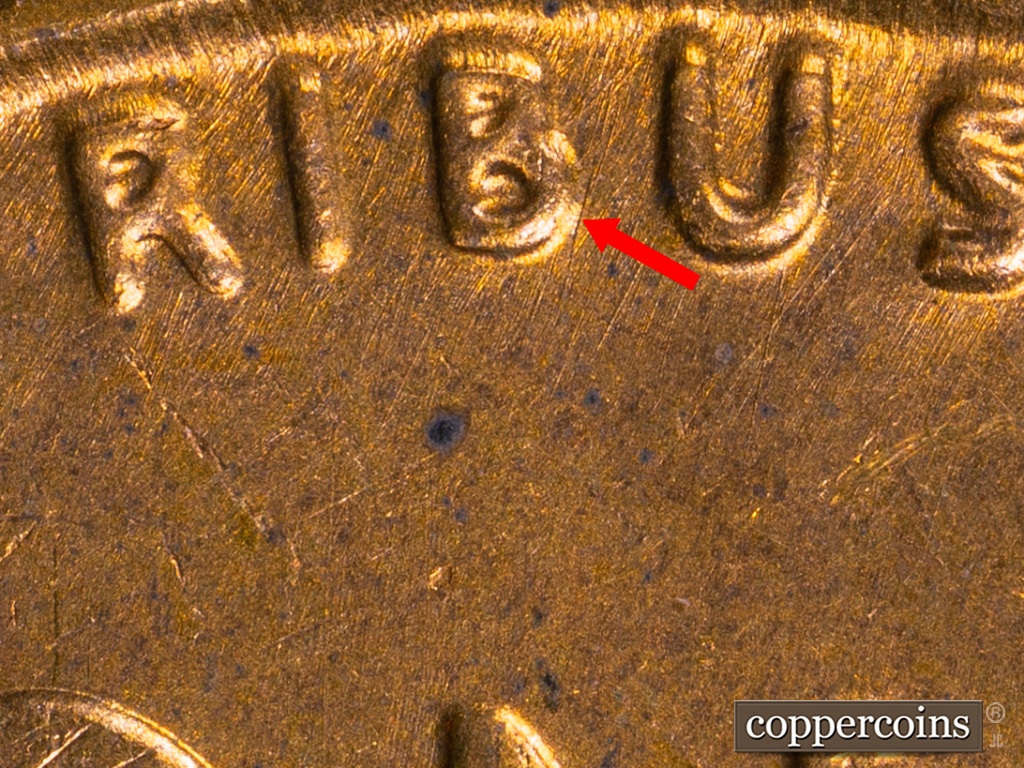 Die-stage D marker on 1938S•1MM•001 showing The marked Die Scratch next to the B in Pluribus appears throughout Stage D.