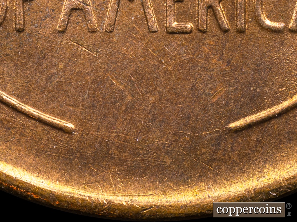 Die-stage E marker on 1938S•1MM•001 showing Heavy Scratches between Wheat Stems.