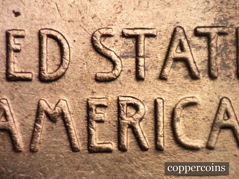 Die-stage B marker on 1938S•1MM•002 (1938 Repunched Mint Mark).