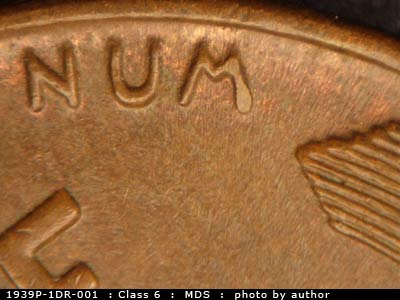 Die-stage B marker on 1939P•1DR•001 (1939 Doubled Die Reverse).