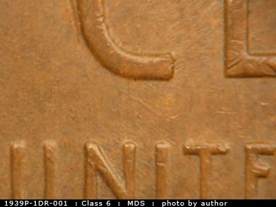Die-stage B marker on 1939P•1DR•001 (1939 Doubled Die Reverse).