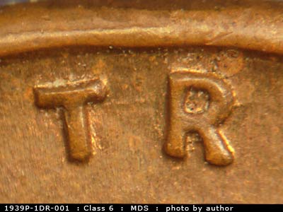 Die-stage B marker on 1939P•1DR•001 (1939 Doubled Die Reverse).