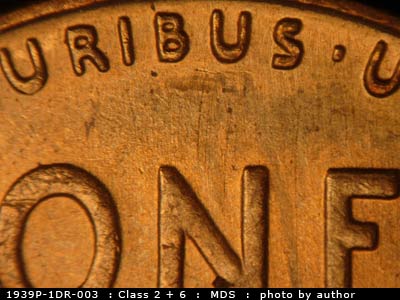 Die-stage B marker on 1939P•1DR•003 (1939 Doubled Die Reverse).