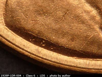 Die-stage C marker on 1939P•1DR•004 (1939 Doubled Die Reverse).