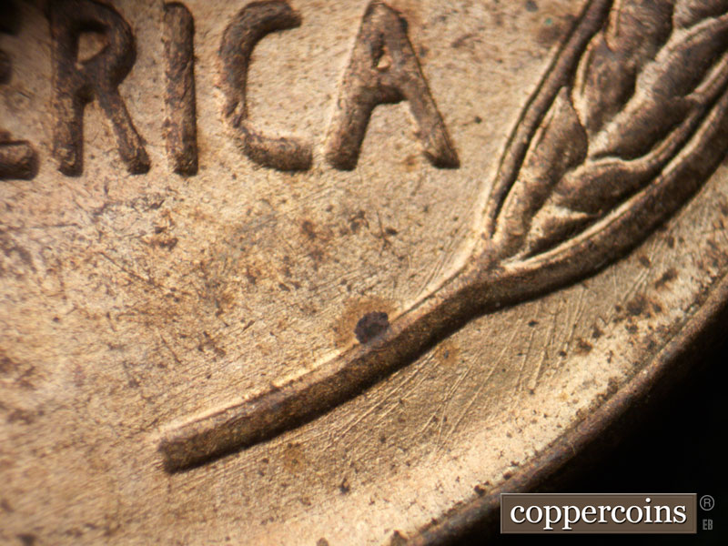 Die-stage B marker on 1939P•1DR•005 (1939 Doubled Die Reverse).